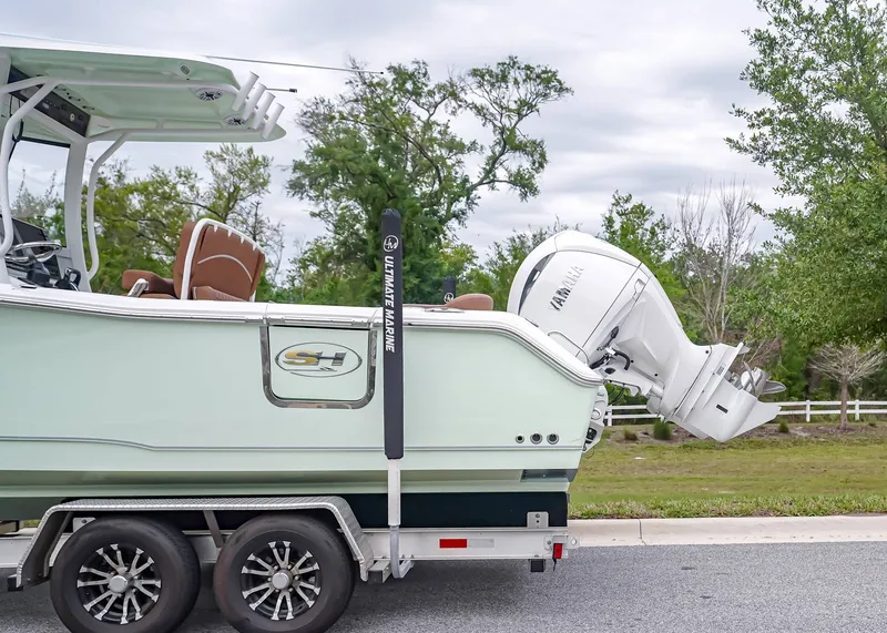 Slide: The Image of Sea Hunt Ultra 265 SE 2026 on trailer with Yamaha engine. - 3
