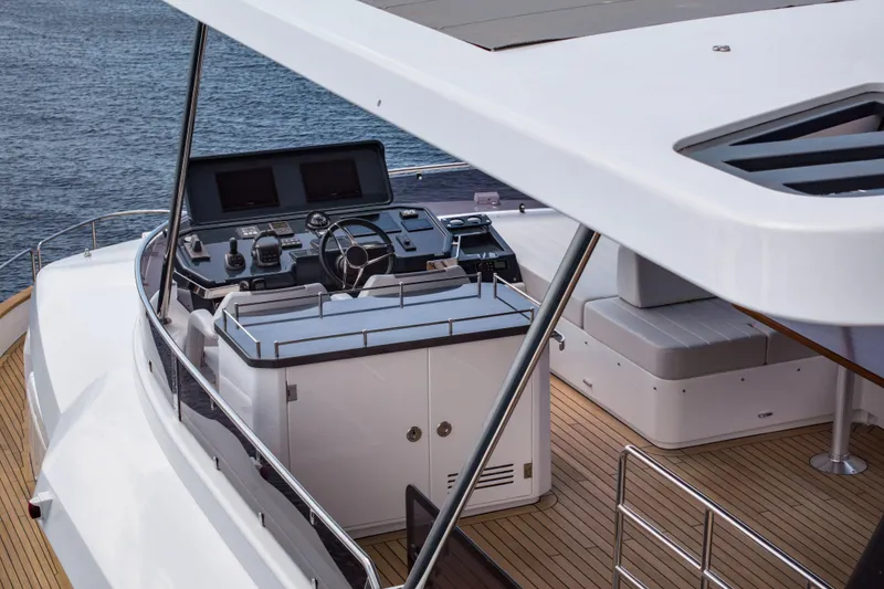 Slide: The Image of Modern Sirena 60 yacht helm with sleek design and advanced controls, 2026 model. - 13