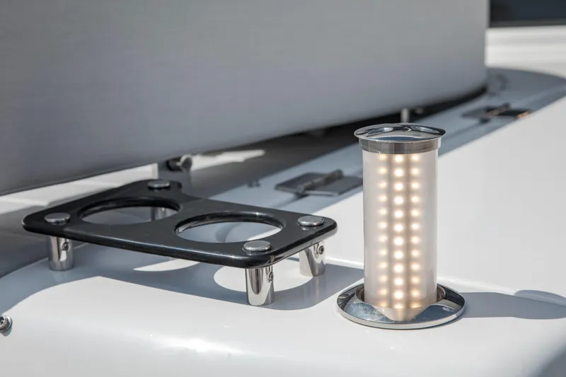 Slide: The Image of LED light and cup holder on 2026 Sirena 60 yacht deck. - 21