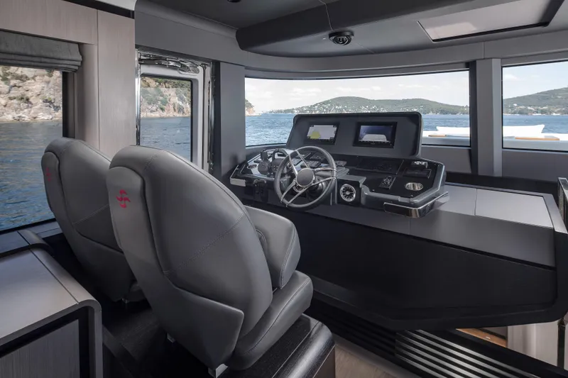 Slide: The Image of Helm of 2026 Sirena 60 yacht with modern controls and panoramic windows. - 30
