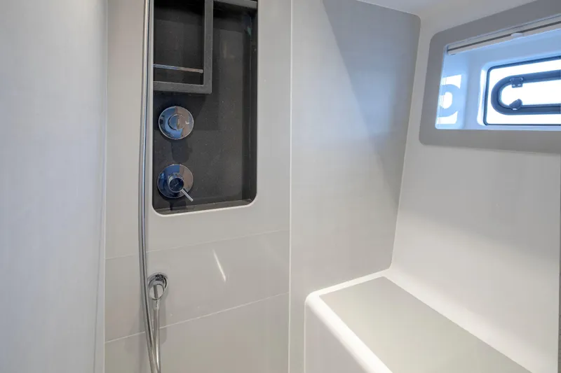 Slide: The Image of Modern shower area in 2026 Sirena 60 yacht with sleek fixtures and window. - 36
