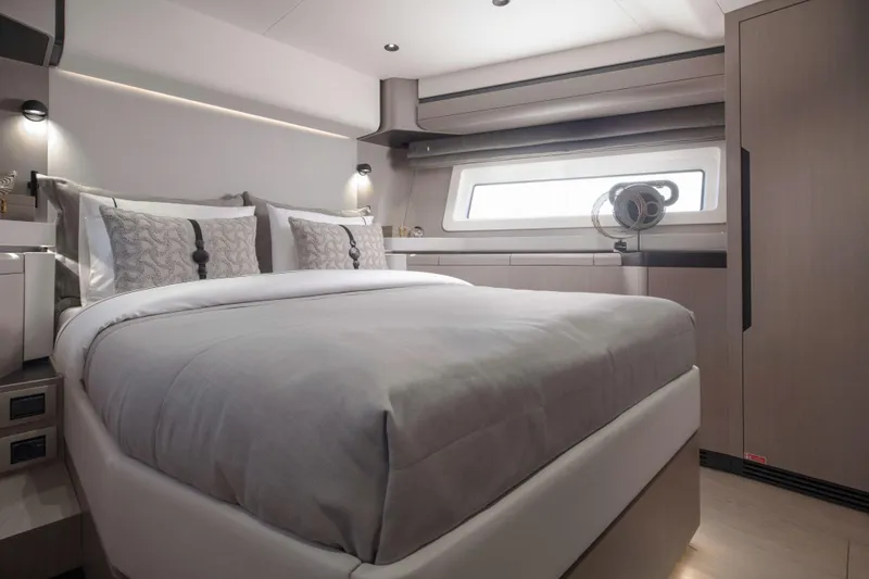 Slide: The Image of Luxurious bedroom interior of 2026 Sirena 60 yacht with modern design and elegant bedding. - 38