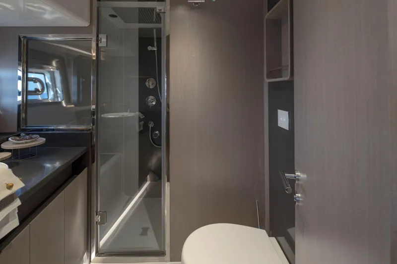 Slide: The Image of Modern bathroom interior on 2026 Sirena 60 yacht, featuring sleek shower and elegant design. - 39