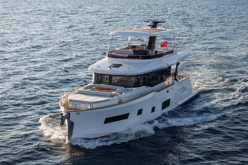 Slide: The Image of 2026 Sirena 60 yacht cruising on open water, showcasing sleek design and luxury features. - 4