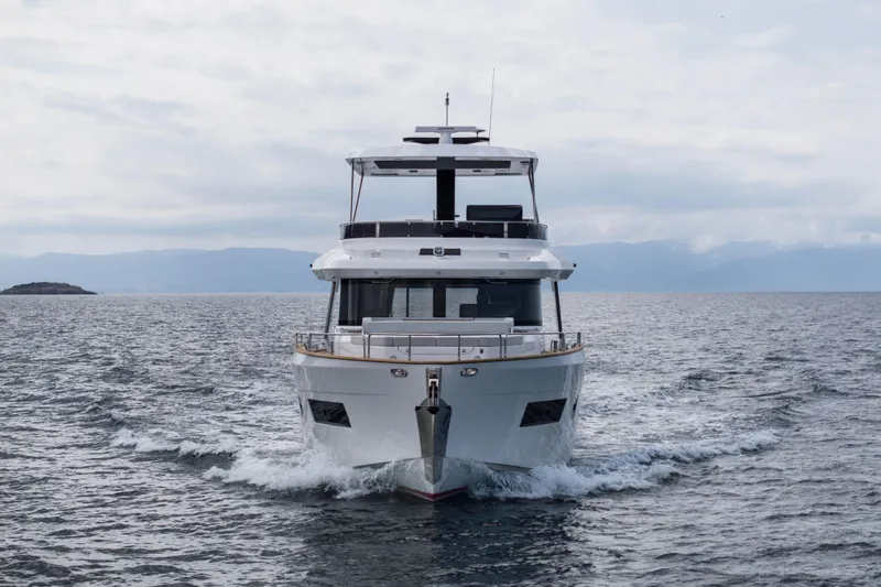 Slide: The Image of Front view of 2026 Sirena 60 yacht cruising on open water. - 6