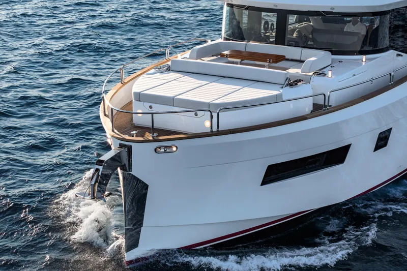 Slide: The Image of Luxurious 2026 Sirena 60 yacht cruising on open sea waters. - 9