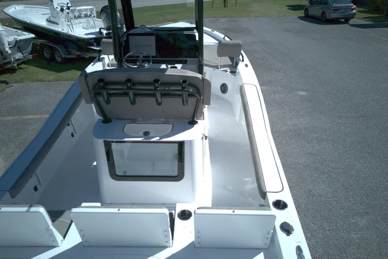 Slide: The Image of 2026 Sea Hunt BX 25 FS boat interior with console and seating. - 10