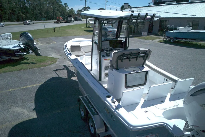Slide: The Image of 2026 Sea Hunt BX 25 FS boat on trailer in outdoor setting. - 6