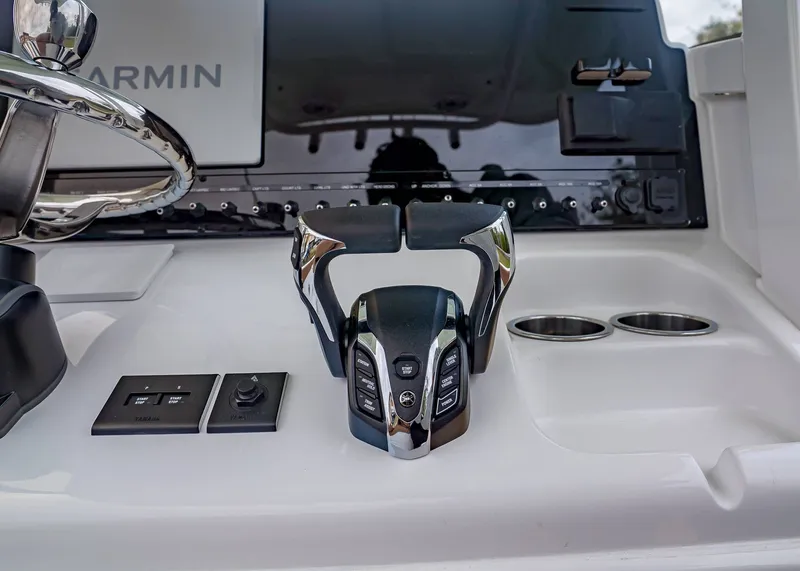 Slide: The Image of Control console of Sea Hunt Ultra 265 SE boat, year 2026. - 16