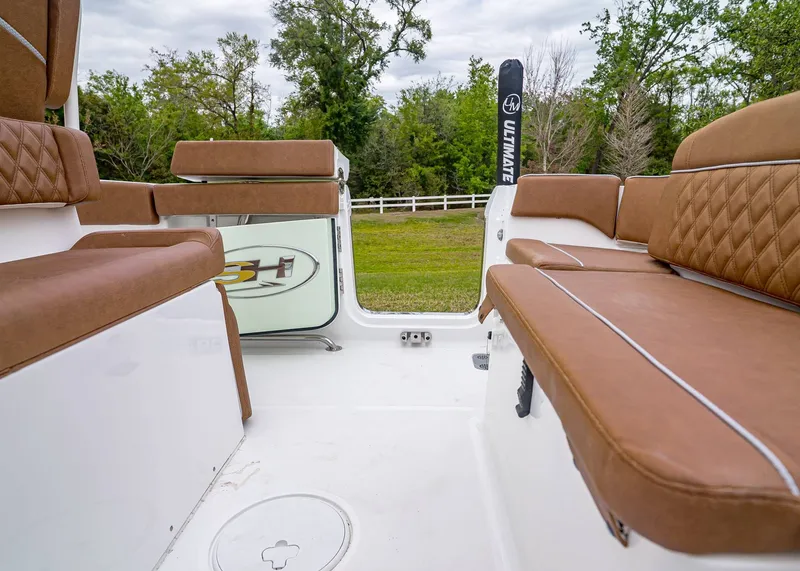 Slide: The Image of Interior of Sea Hunt Ultra 265 SE boat, brown upholstery, 2026 model. - 9
