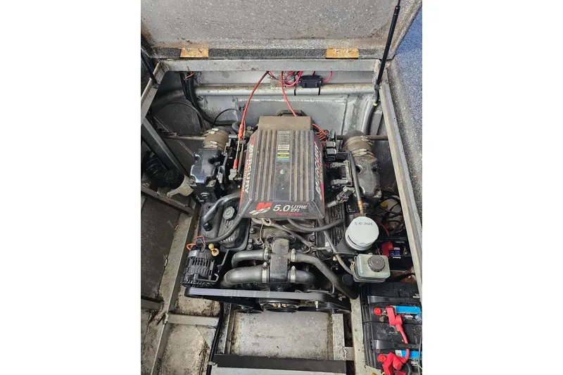 Slide: The Image of Engine compartment of a 2001 Sumerset 16x79 houseboat with Mercury 5.0L engine. - 55