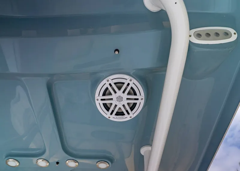 Slide: The Image of Underside of Sea Hunt Ultra 229 boat, featuring speaker and lights. - 13