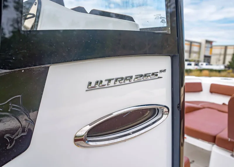 Slide: The Image of Close-up of Sea Hunt Ultra 265 SE boat emblem, 2024 model. - 19