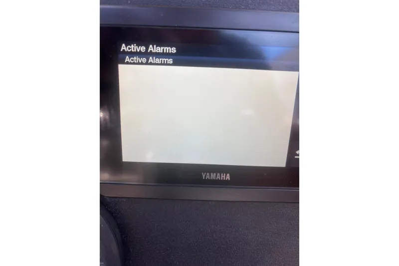 Slide: The Image of Yamaha display showing active alarms on 2006 Scout 240 Bay Scout boat. - 11