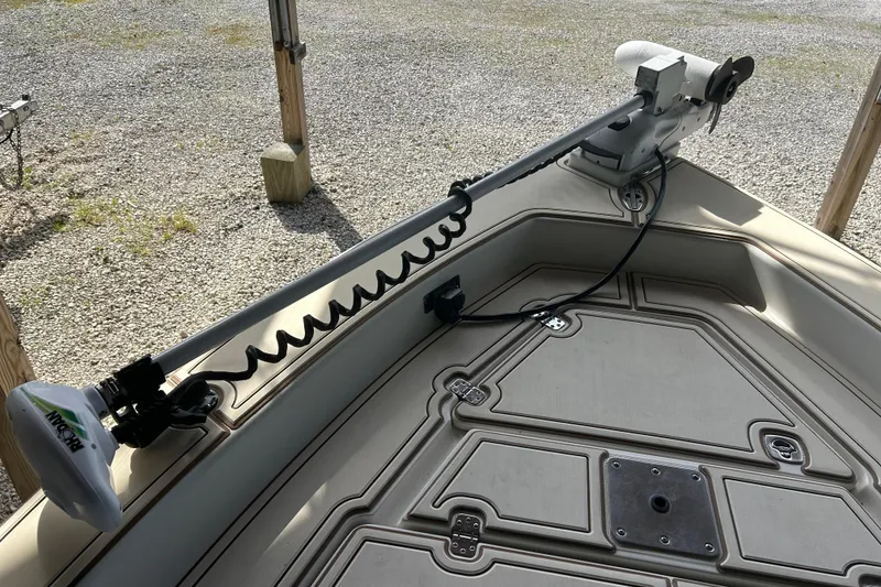 Slide: The Image of 2006 Scout 240 Bay Scout boat with Minn Kota trolling motor on deck. - 5