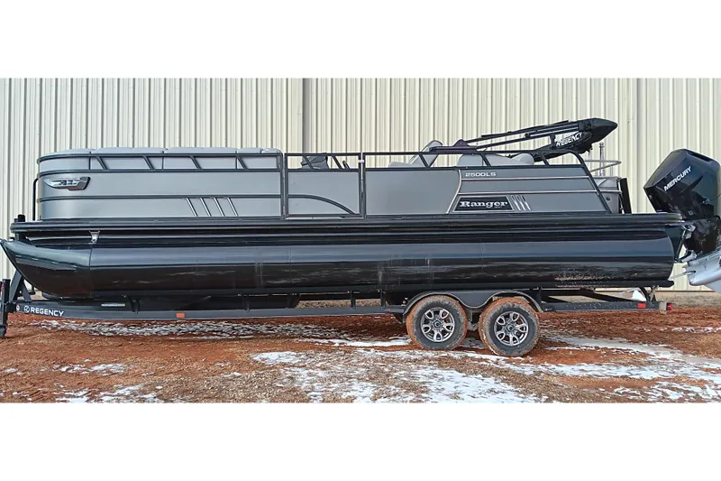 The Image of 2024 Ranger 2500LS pontoon boat on trailer, parked outdoors. - 0