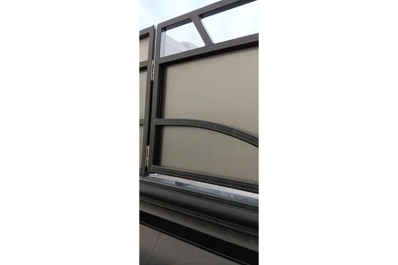 Slide: The Image of 2024 Ranger 2500LS boat railing with sleek black frame and modern design. - 13