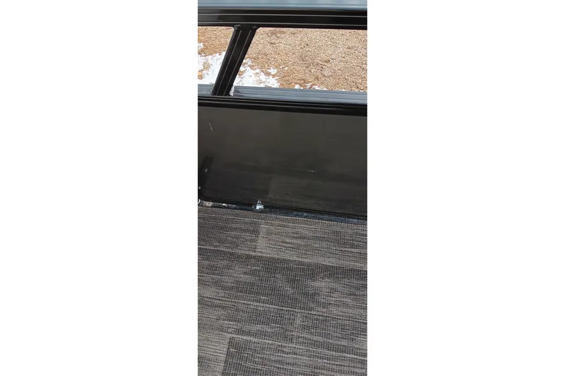 Slide: The Image of Interior view of 2024 Ranger 2500LS with carpeted flooring and black paneling. - 32