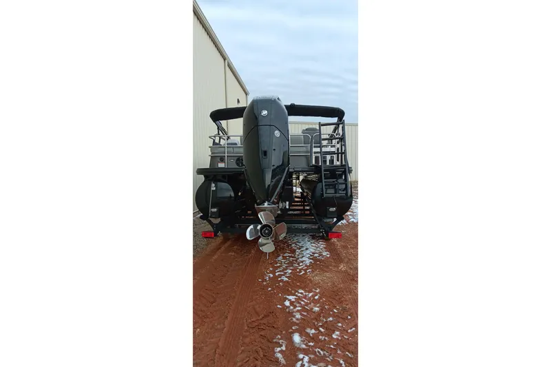 Slide: The Image of Rear view of 2024 Ranger 2500LS boat with powerful outboard motor. - 5