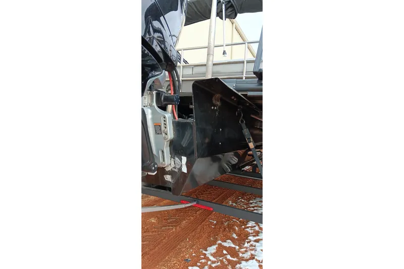 Slide: The Image of 2024 Ranger 2500LS boat trailer hitch on snowy ground. - 6