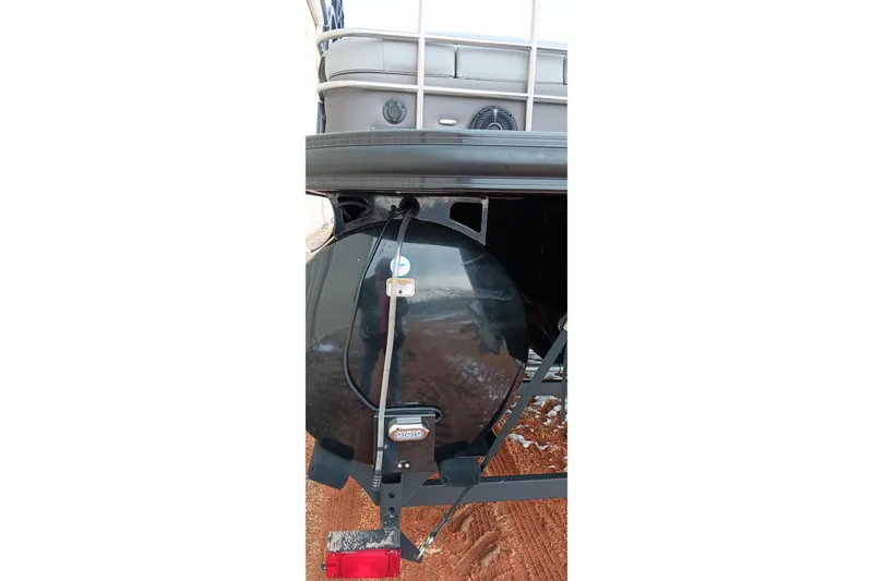 Slide: The Image of 2024 Ranger 2500LS boat trailer with black wheel and wiring details. - 9