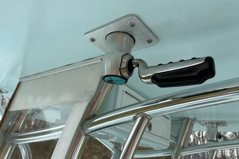 Slide: The Image of Close-up of a 2019 Stoner 23 CC boat handle and mounting bracket. - 16