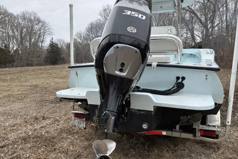 Slide: The Image of 2019 Stoner 23 CC boat with 350 horsepower engine on trailer. - 3