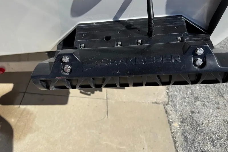 Slide: The Image of Seakeeper device on 2026 Sea Pro 242 Center Console boat, mounted on the hull. - 8