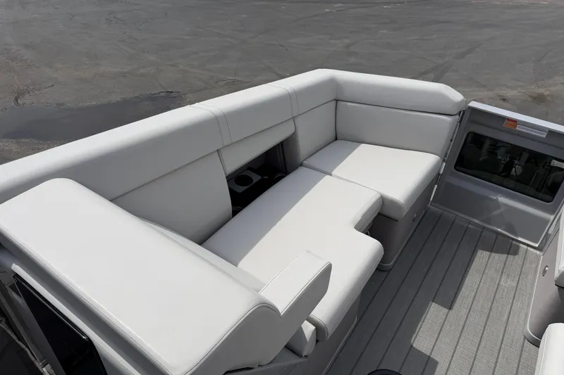 Slide: The Image of Luxurious seating area on 2025 Balise HORIZON 24C boat, featuring sleek white upholstery. - 29