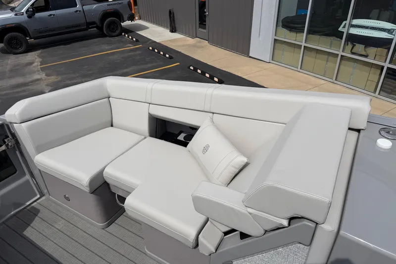 Slide: The Image of Luxurious seating on 2025 Balise HORIZON 24C boat, featuring plush white upholstery. - 30
