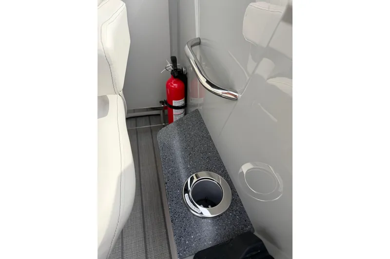 Slide: The Image of Interior of Balise HORIZON 24C 2025 with cup holder and fire extinguisher. - 33