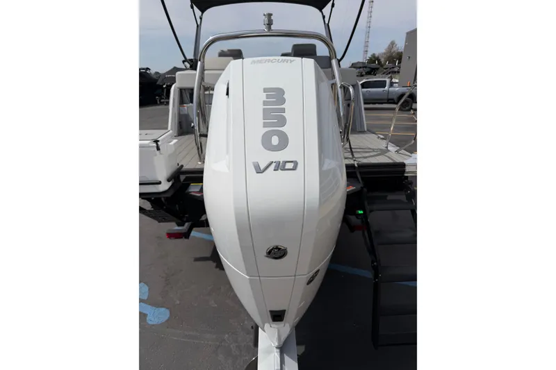 Slide: The Image of 2025 Balise HORIZON 24C boat with Mercury 350 V10 engine, rear view. - 6