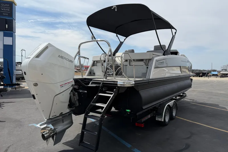Slide: The Image of 2025 Balise HORIZON 24C pontoon boat with Mercury outboard motor on trailer. - 8