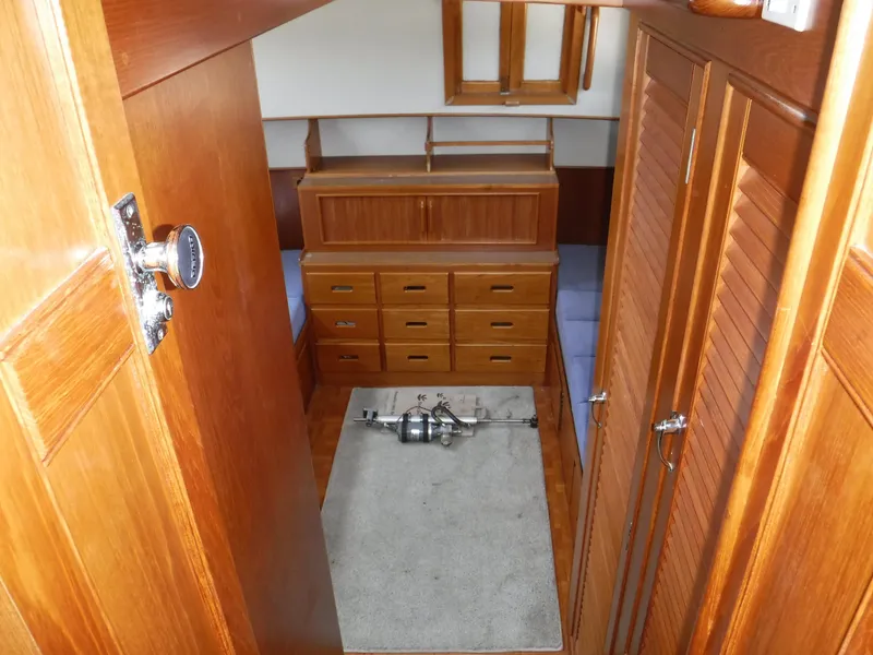 Slide: The Image of Interior of a 1989 Grand Banks 36 Classic yacht with wooden furnishings. - 11