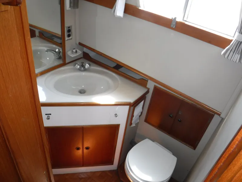 Slide: The Image of Bathroom in 1989 Grand Banks 36 Classic with sink and toilet. - 16