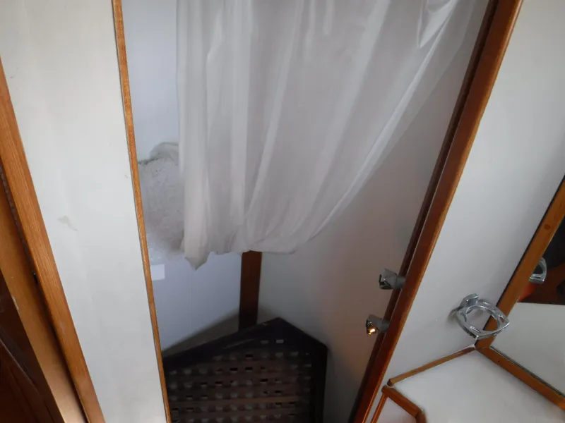 Slide: The Image of Interior of 1989 Grand Banks 36 Classic with shower curtain. - 17