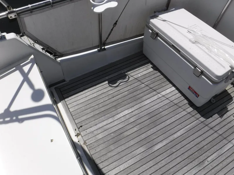 Slide: The Image of Deck of a 1989 Grand Banks 36 Classic with cooler. - 18