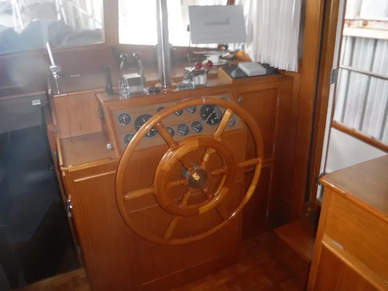 Slide: The Image of Helm of the 1989 Grand Banks 36 Classic yacht. - 31