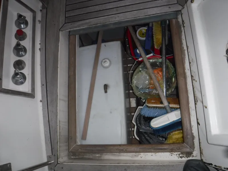 Slide: The Image of Storage compartment in 1989 Grand Banks 36 Classic boat. - 42