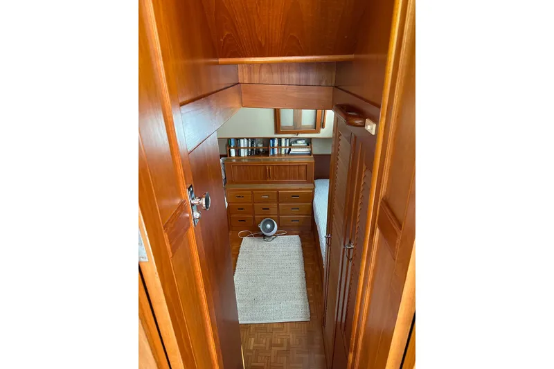 Slide: The Image of Interior of 1989 Grand Banks 36 Classic yacht with wooden cabinetry and cozy furnishings. - 59