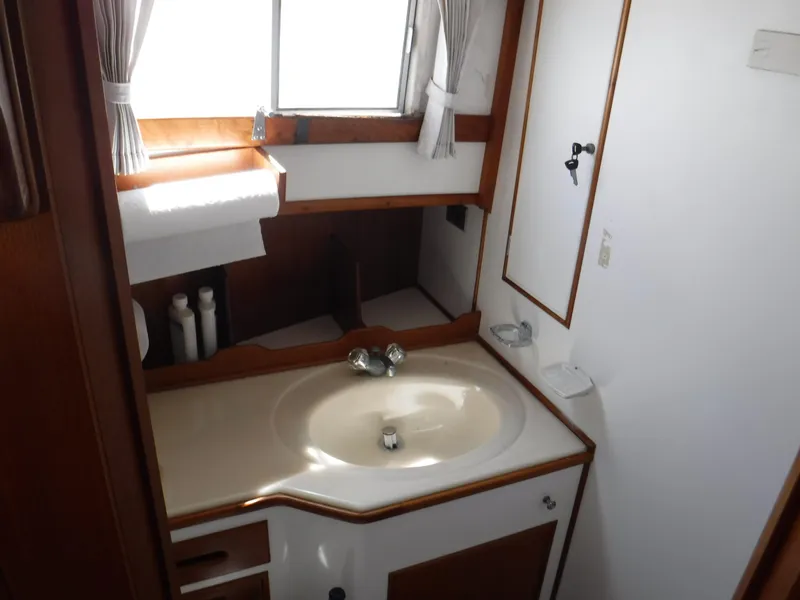 Slide: The Image of Bathroom in 1989 Grand Banks 36 Classic with sink and window. - 9