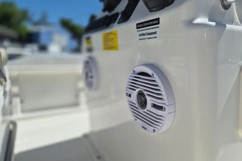 Slide: The Image of 2026 Key West 1720 Center Console boat with cushioned seating and modern design. - 6