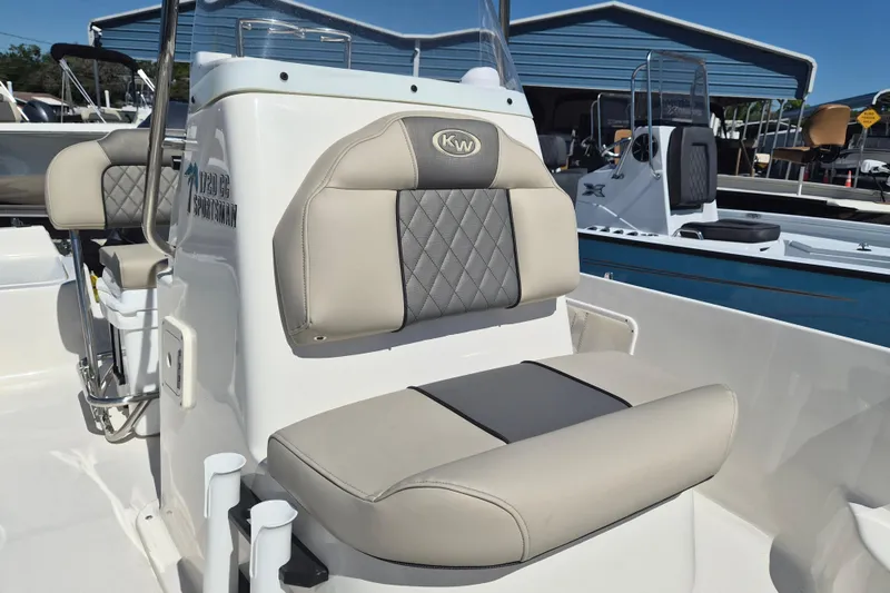 Slide: The Image of 2026 Key West 1720 Center Console boat interior with storage compartment. - 7