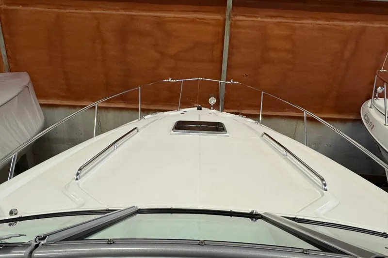 Slide: The Image of 2015 Chaparral 330 Signature boat bow view in storage. - 15