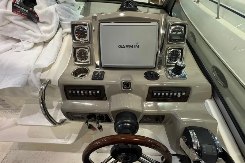 Slide: The Image of Control panel of 2015 Chaparral 330 Signature boat with Garmin navigation system. - 20