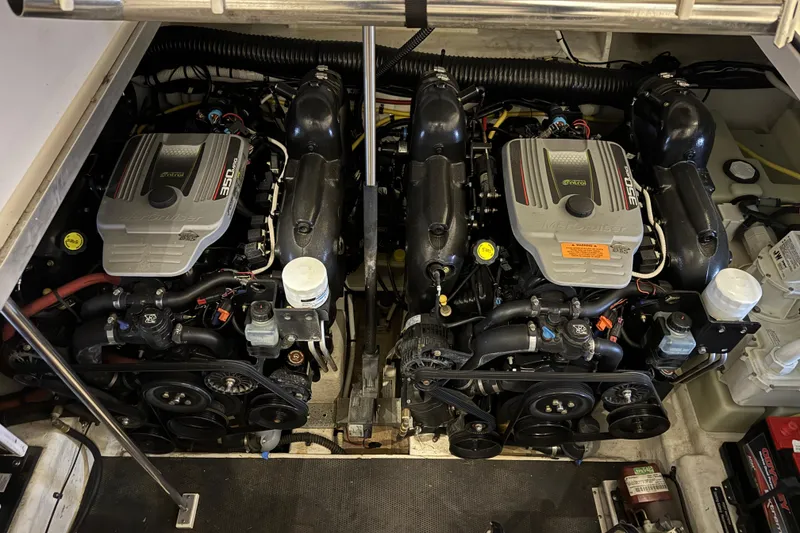 Slide: The Image of Twin engines in a 2015 Chaparral 330 Signature boat engine compartment. - 33