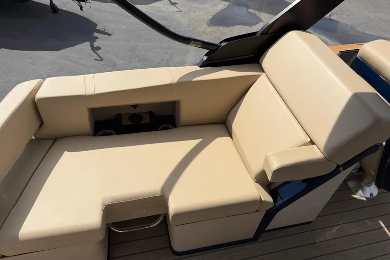 Slide: The Image of Luxurious beige seating on 2025 Balise HORIZON26C boat, featuring cup holders and sleek design. - 17
