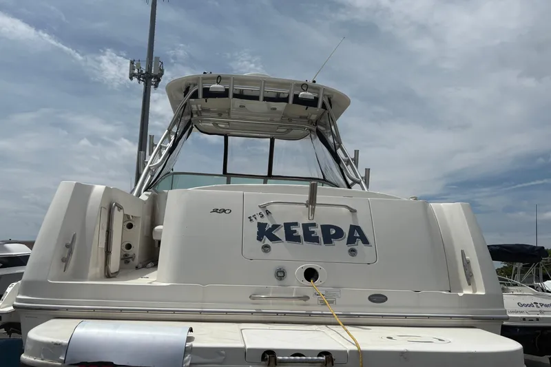 Slide: The Image of 2008 Searay 290 Amberjack boat docked under cloudy sky. - 3