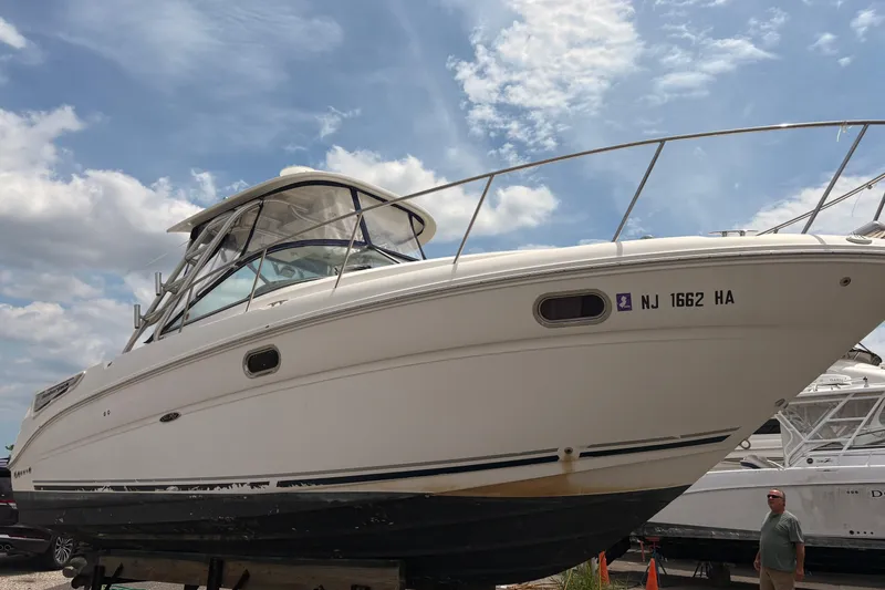 Slide: The Image of 2008 Searay 290 AMBERJACK boat on display under a partly cloudy sky. - 5