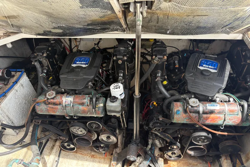Slide: The Image of Twin engines in a 2008 Searay 290 AMBERJACK boat engine compartment. - 6